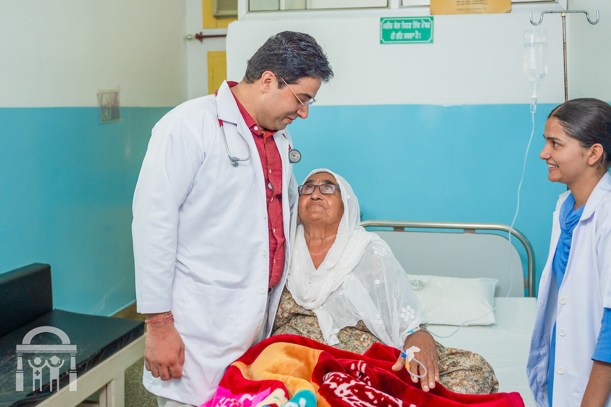 Patient hugging doctor in private room at Guru Nanak Mission Hospital in Dhahan Kaleran near Banga and Phagwara in Punjab