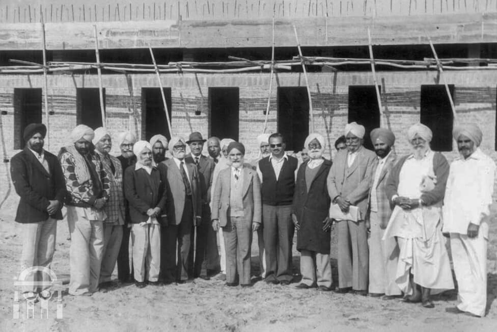 group in front of Guru Nanak Mission Hospital building progress - historical photo